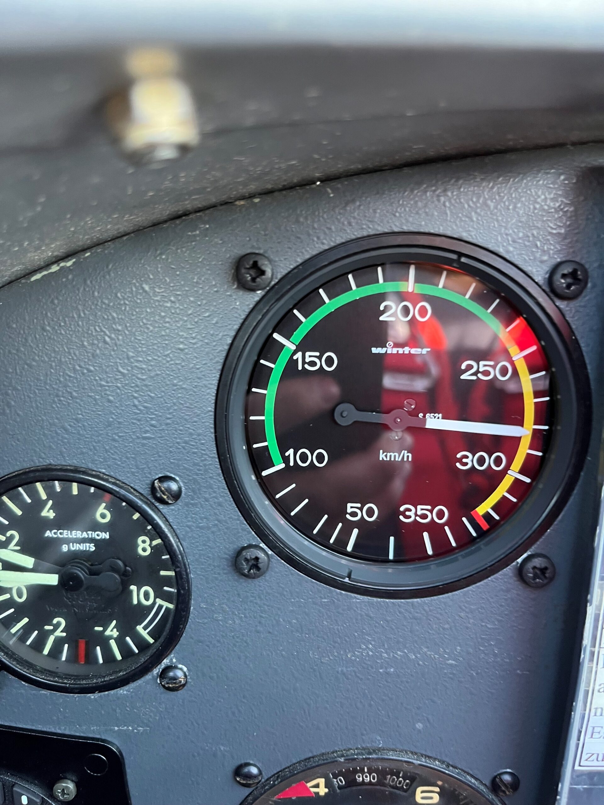 Airspeed indicator in the cockpit of the aerobatic aircraft