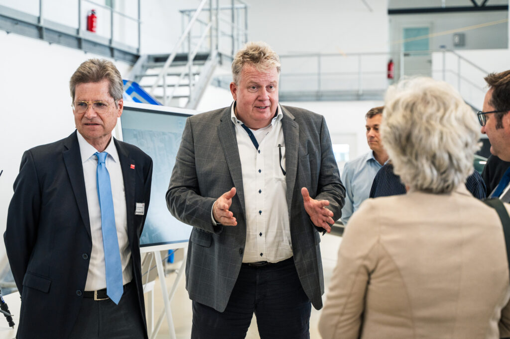 REISER representative explaining the EILT project to visitors
