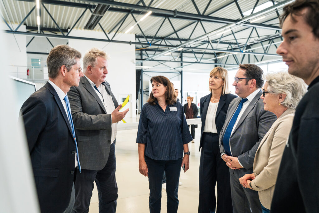 Guests of the EILT project presentation in the hangar