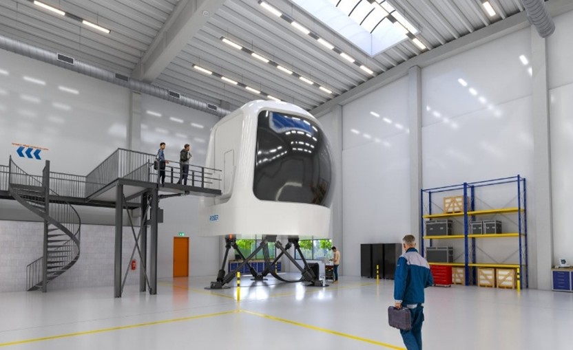 Full flight simulator in the hall with a person for scale