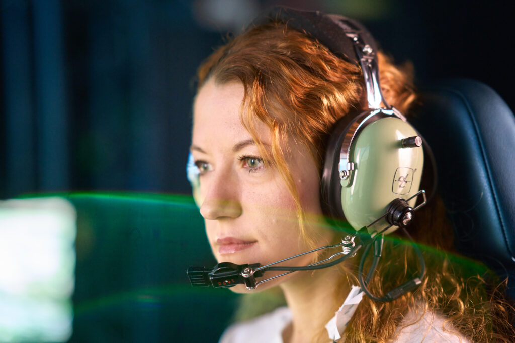 Operator an der Simulator-Steuerung