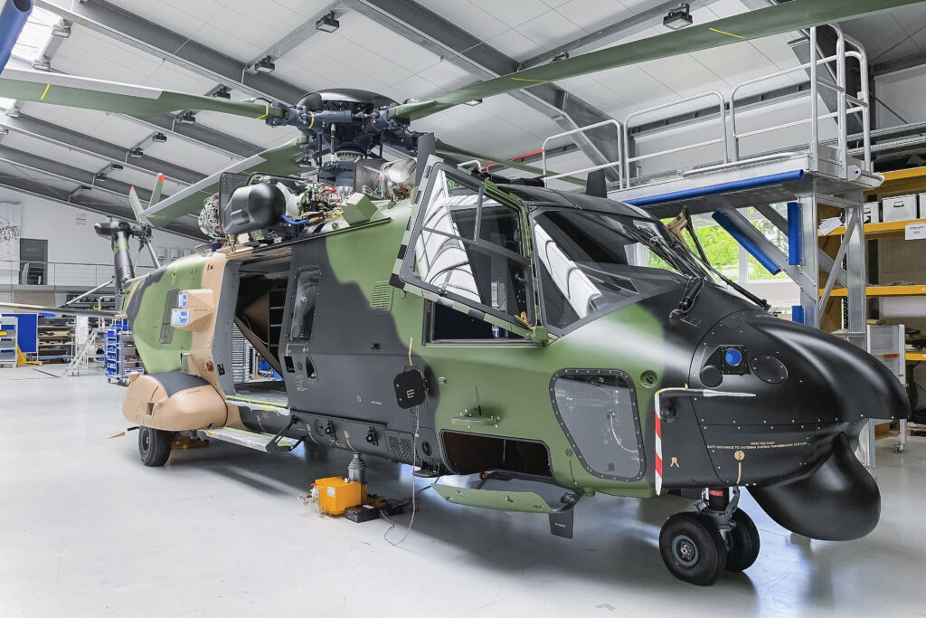 NH90 helicopter in camouflage livery in the hall